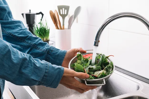 Greenwave tap faucet water filter for safer salad prep in the kitchen.