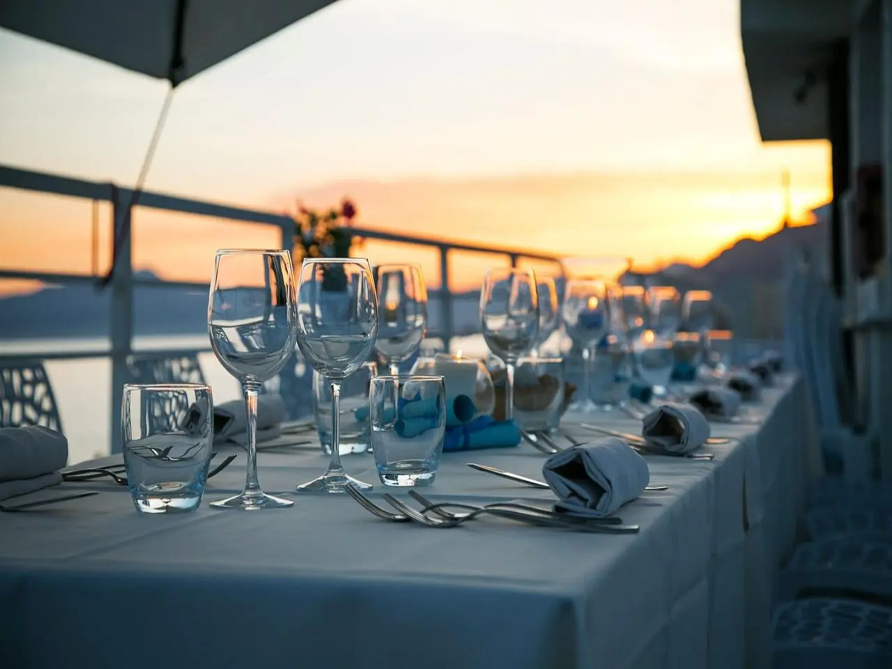 Restaurant table setup at sunset — water purification solution in China for hotels and dining, RO water purifier China by the best water purifier company in Shanghai.