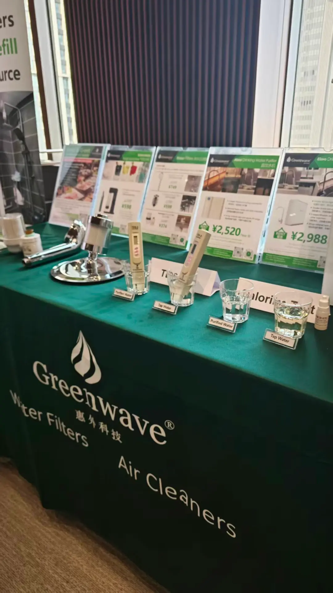 TDS and chlorine tests comparing tap vs. purified water at the Greenwave China showroom.